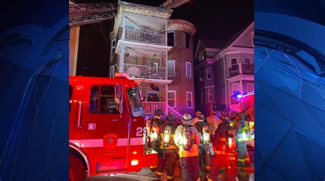 Crews battle fire across three triple deckers in Dorchester